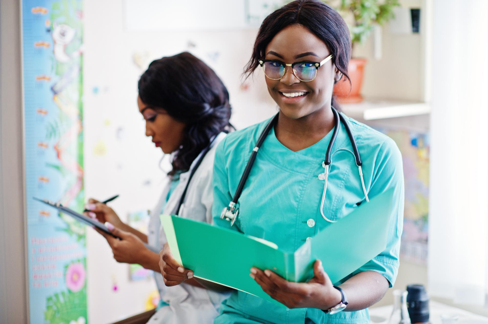 A clinical officer holding a file