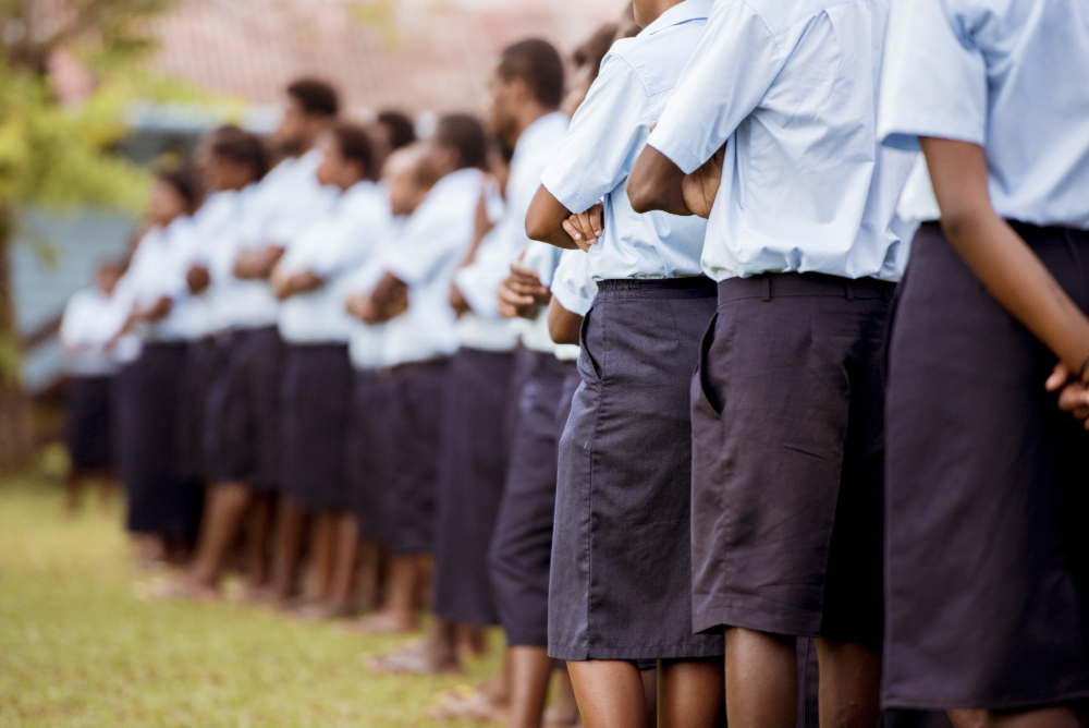 Shallow focus of students standing in line